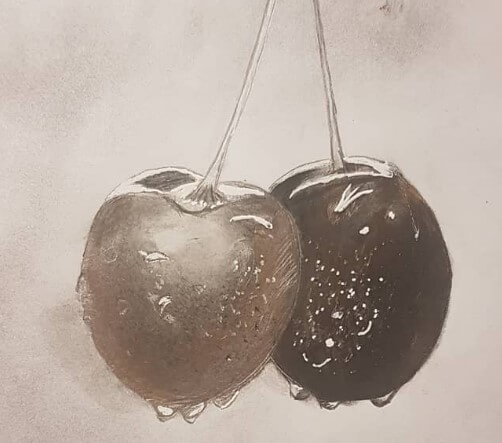 Charcoal drawing of two cherries with water droplets.